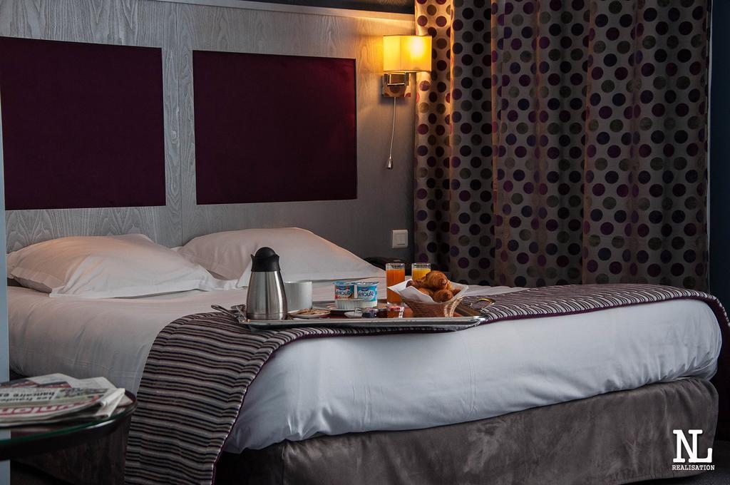 Hotel L'Univers Реймс Экстерьер фото
