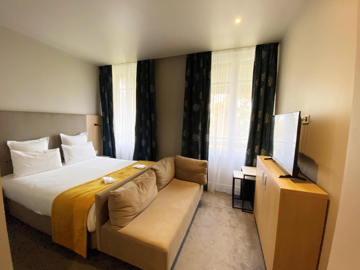 Hotel L'Univers Реймс Экстерьер фото